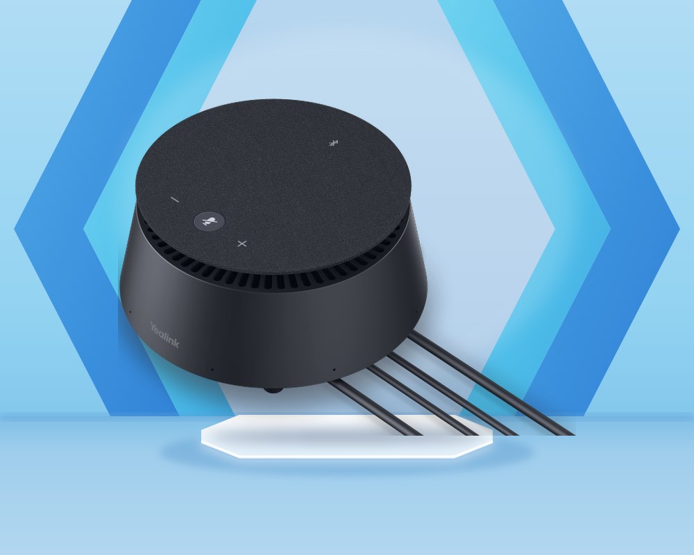 Yealink CP50 conference speakerphone, a round dark gray unit with mute and volume buttons on top