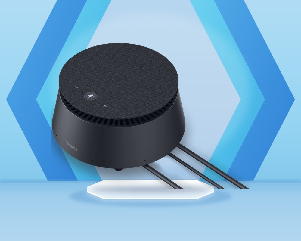 Yealink CPE40 extension microphone seen from above, a round dark gray unit with mute and volume buttons